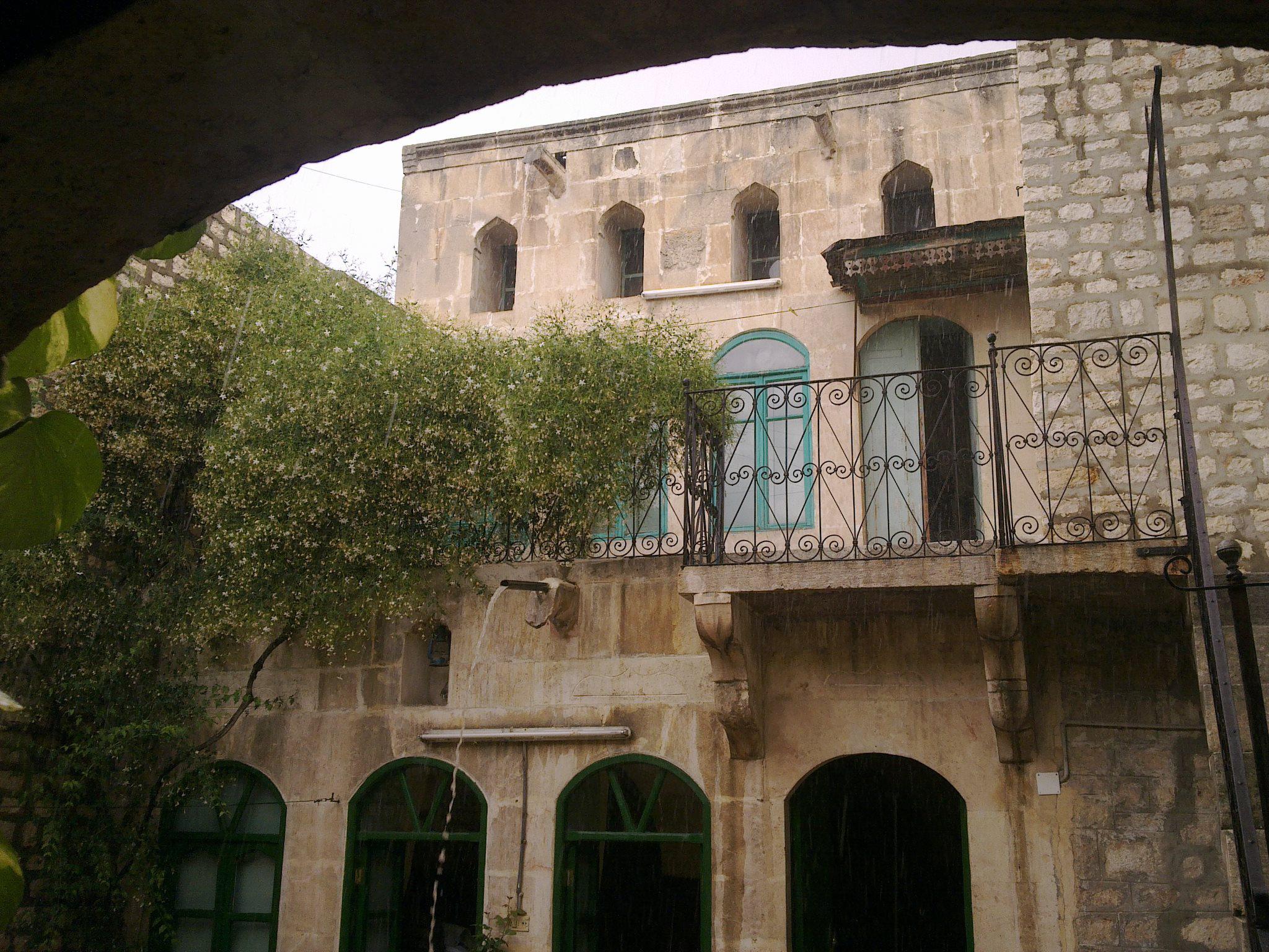 Upstairs bedroom recedes to allow more light and air downstairs - AlHakam Shaar 2010