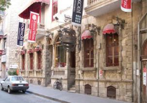 "A historical building, Iskenderun Street, al-Jamiliye" by Vito Press